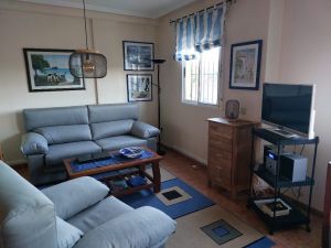 Die gemütliche Wohnecke mit Fernseher - Bild 4: Ferienhaus im andalusischen Stil von privat an der Costa Blanca in Spanien