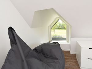 Schlafzimmer 3 mit Sitzsack und Spielecke im DG - Bild 19: exklusive Reetdach Villa nur 500 Meter bis zum Strand für 6+2 Personen