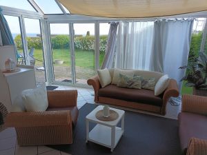 Zum großen, gemütlichen Wintergarten mit Meerblick, großen Falttüren und offenem Kamin braucht man wohl nicht mehr viel sagen/schreiben, oder? - Bild 6: Top-Haus, Ostsee, Lübecker Bucht, Meerblick Hunde