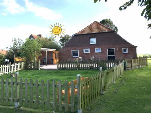 Freisitz mit offener Windschutztür - Bild 25: Huus-Thimo an der Nordseeküste - Hunde willkommen - rauchen erlaubt - WLAN