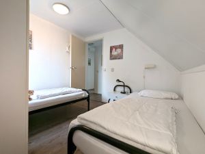 Kinderzimmer im OG mit 2 Einzelbetten - Bild 14: Haus Birgit mit eingezäunten Garten am Ijsselmeer für Urlaub mit dem Hund