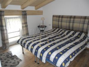 Ferienhaus Villa NINI mit eingezäunten Garten und privatem Swimmingpool Hunde willkommen
Schlafzimmer 1 im OG - Bild 13: Villa Nini mit eingez. Garten, Pool am Ledrosee für Urlaub mit dem Hund