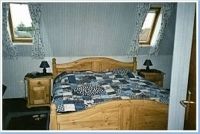 Schlafzimmer mit Doppelbette, Aufstellmöglichkeit für Kinderreisebett (vorhanden) - Bild 2: FeWo Rübennest 3b Obergeschoss für 4 Personen, Hunde willkommen