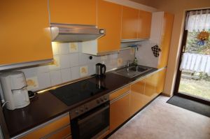 ist gut ausgestattet und bietet einen Ausgang nach draußen. - Bild 4: Ferienwohnung EifelNatur 2 - großzügige FeWo für bis zu 7 Personen