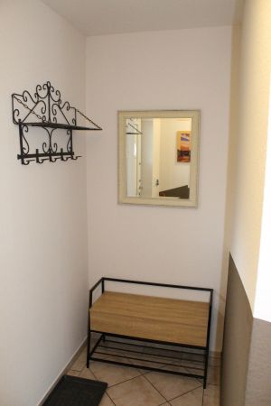Garderobe mit Schuhschrank - Bild 26: Ferienhaus Kiek Över mit Sauna und Kamin in Prerow