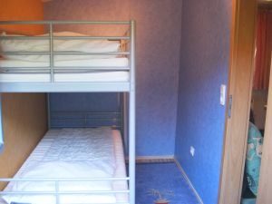 Doppelstockbett- ideal für Kinder in separatem Schlafraum des Ferienhauses - Bild 8: Ferienhaus "Anna" auf Rügen zwischen den Ostseebädern Binz und Sellin