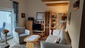 gemütlich und schöner Blick in den Garten - Bild 2: Steuerbord-Haus strandnaher Hundeurlaub im ruhig gelegenen Ferienhaus