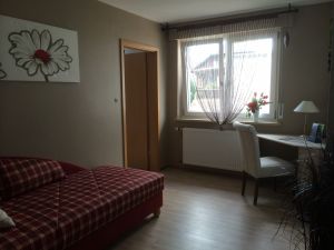 In diesem Zimmer befindet sich ein weiteres Fernsehgerät. - Bild 15: Tolles vier Sterne und vier Pfoten Ferienhaus im Hunsrück, Hunde willkommen