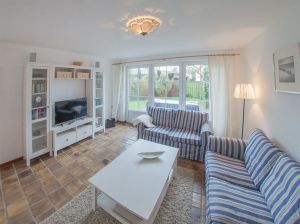 Sofa mit TV/Unterhaltung - Bild 3: Ferienhaus Strandperle im Nordseebad Dangast, 95 qm bis 6 Personen und Hund