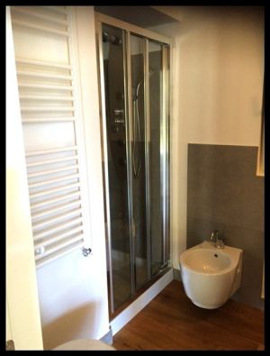 Bild 16: Ferienhaus Regina mit eingezäunten Garten und Seeblick