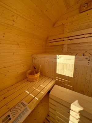 Bild 3: Ferienhaus Regina mit eingezäunten Garten und Seeblick