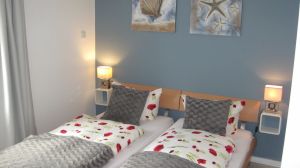 Hier das eine der beiden Schlafzimmer. Beide haben ein 180er Doppelbett. In einem Schlafzimmer befindet sich ein weiterer TV. - Bild 14: Hundefreundlich Ostsee mit tollem Meerblick