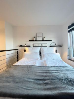 Bequemes Doppelbett mit Traumblick auf die Berglandschaft - Bild 19: TOP Ferienwohnung "AussichtsReich" in Hahnenklee für 2 - 3 Pers. und Hund