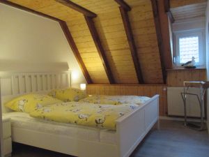 Bild 10: Hooksiel: Fewo MÖWE. Zentral, strandnah, ruhig gelegen, mit Balkon