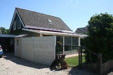 Bild: FH Sheltiehouse mit eingezäunten Garten + strandnah! Hunde willkommen