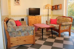 Bild 1: Landhaus am Teich - Ferienwohnung rot - Saaler Bodden - Ostsee