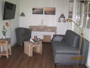 Wohnbereich mit Schlafcouch - Bild 2: Ferienwohnung Marite Scharbeutz-Klingberg
